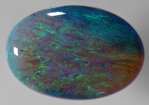 Gorgeous 7.09 carat blue/green Opal with high cabochon