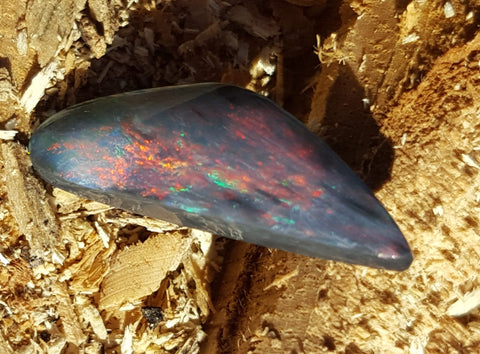 5.06 carat rare & unique solid black red Opal!