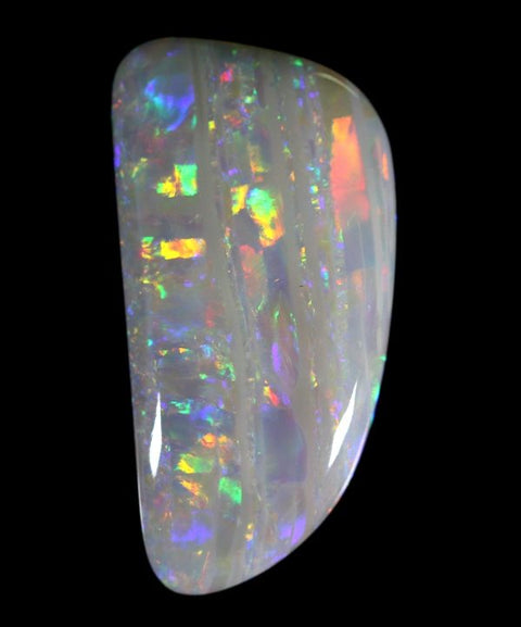 Very bright red multi-coloured free-form solid semi-black Opal!
