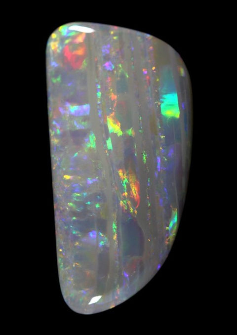 Very bright red multi-coloured free-form solid semi-black Opal!