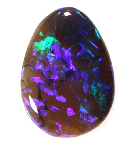 2.64 carat off tear drop shape with mauve pattern!