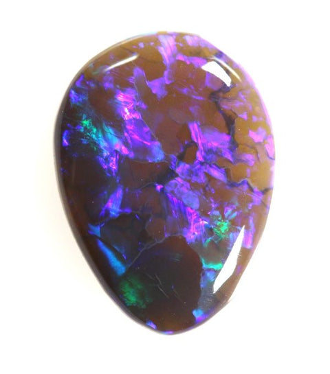 2.64 carat off tear drop shape with mauve pattern!