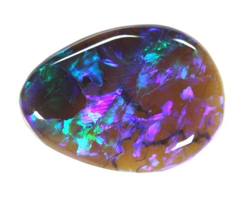2.64 carat off tear drop shape with mauve pattern!