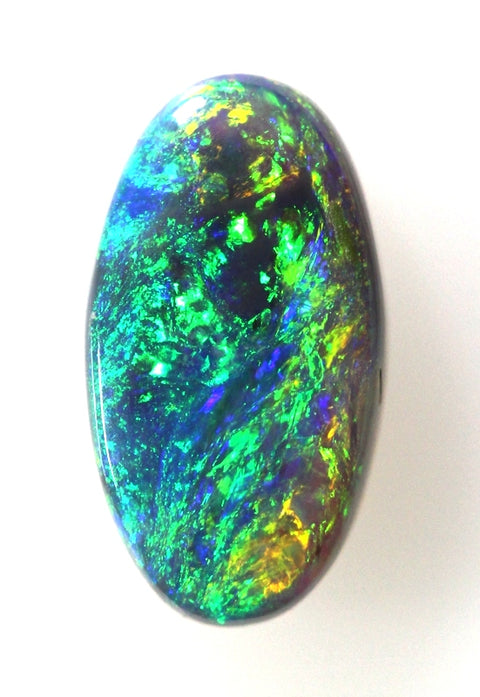 Beautiful blue/green/gold solid Opal!