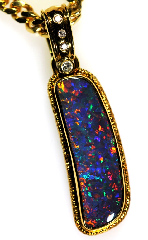 Solid Black Opal Pendant 18ct Gold